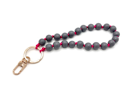 Schlüsselanhänger aus Holzperlen mit Karabiner Anthrazit/Pink