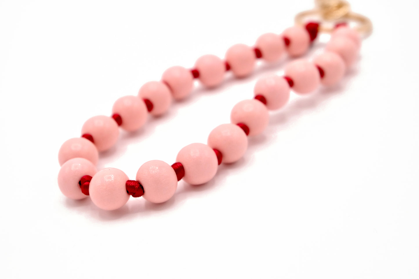 Schlüsselanhänger aus Holzperlen mit Karabiner Rosa/Rot