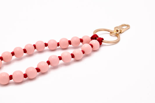 Schlüsselanhänger aus Holzperlen mit Karabiner Rosa/Rot